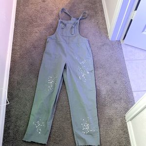 XS american eagle overalls with paint splatter details - light sage green color